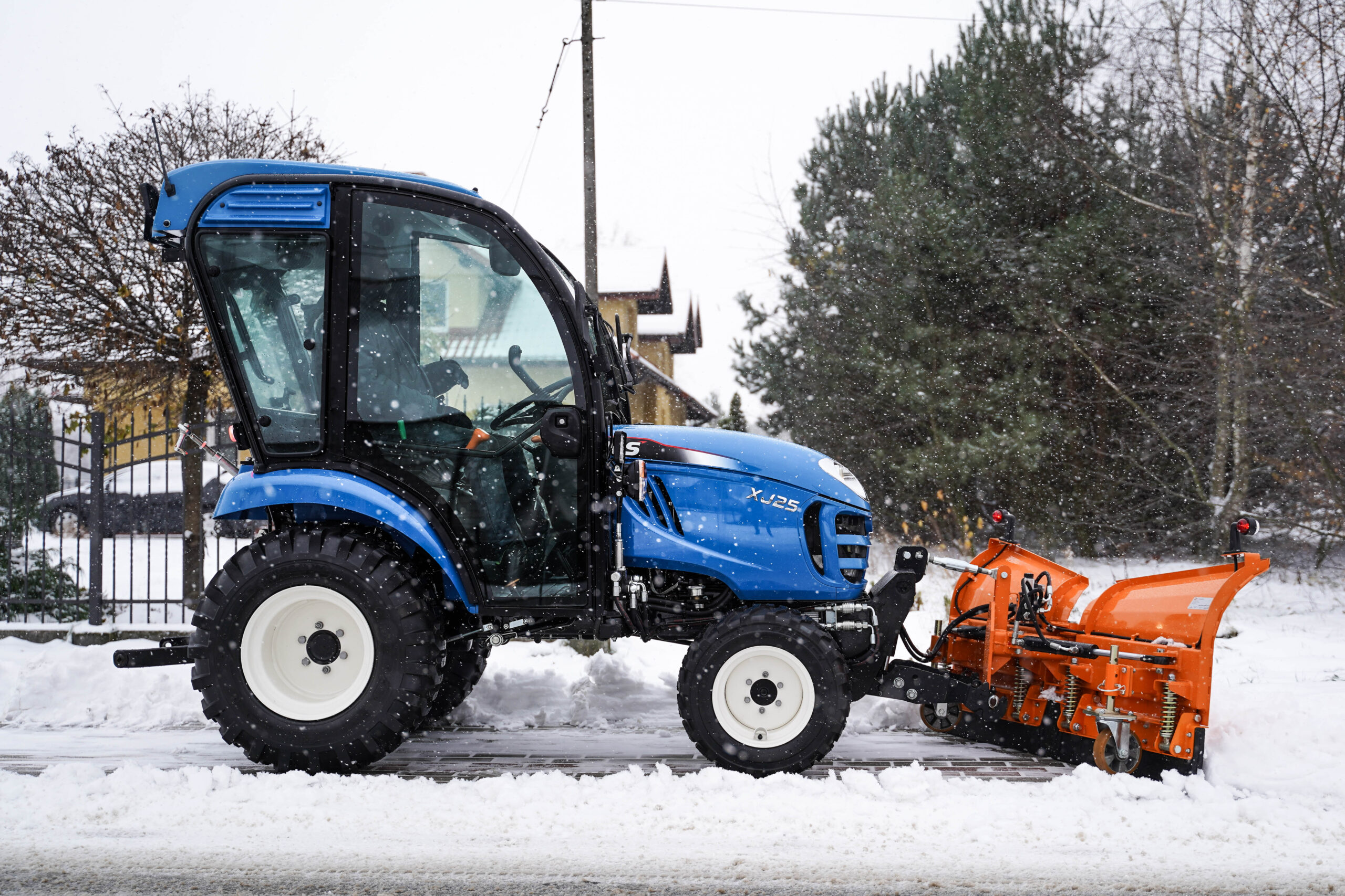 Is a mini tractor mower suitable for snow clearing?