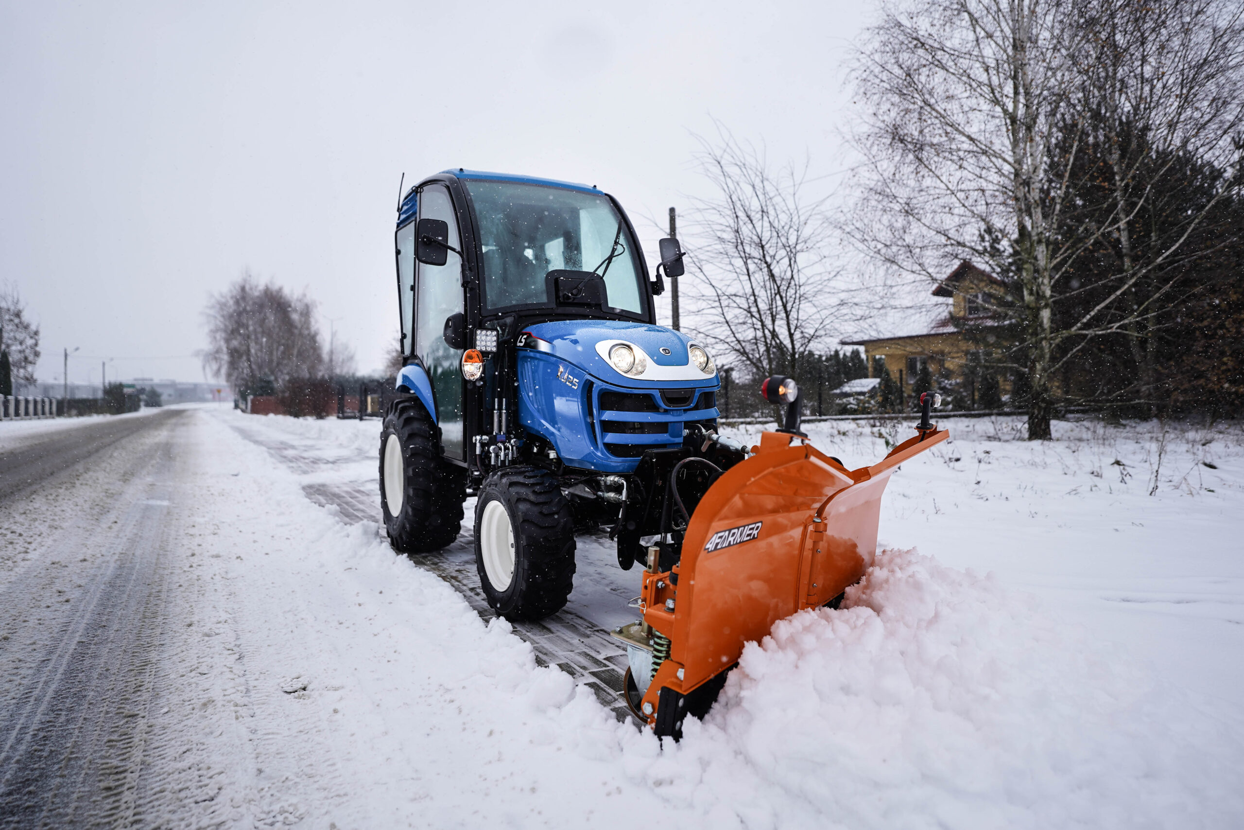 Is a mini tractor mower suitable for snow clearing?